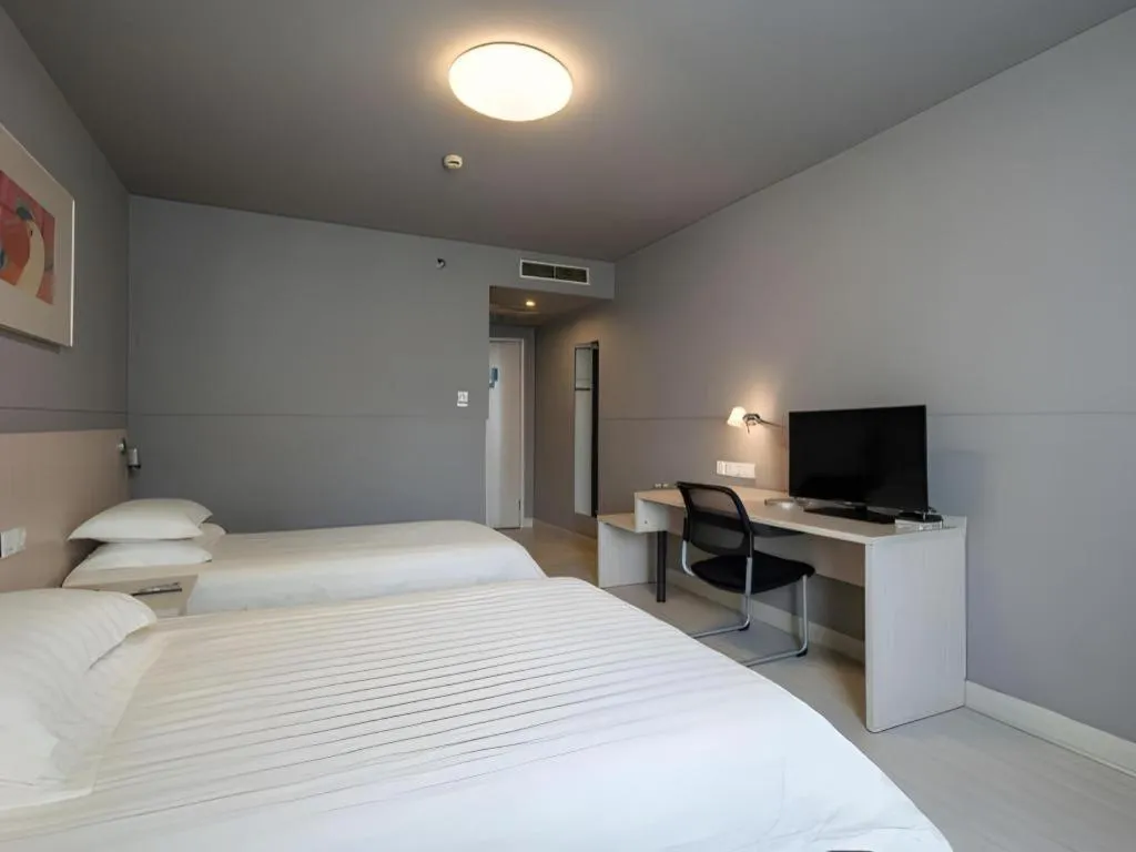 Bed in Magnotel Classic Shenyang General Hospital of Northern Theater Command