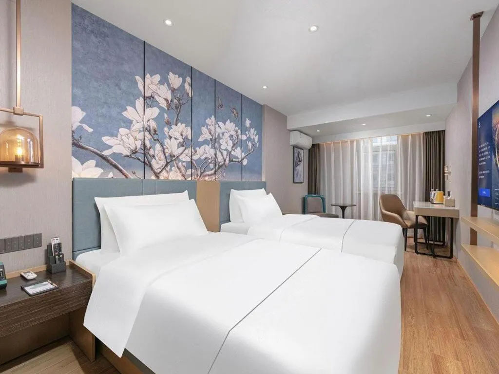 Bed in Magnotel Classic Shenyang General Hospital of Northern Theater Command