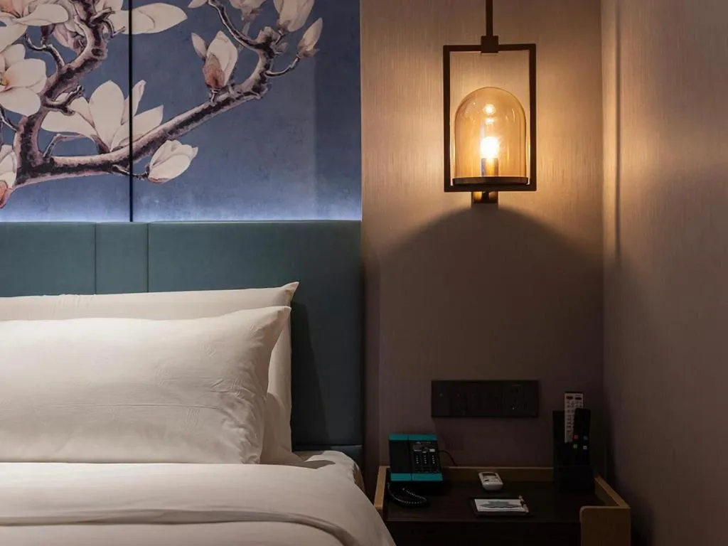 Bed in Magnotel Classic Shenyang General Hospital of Northern Theater Command