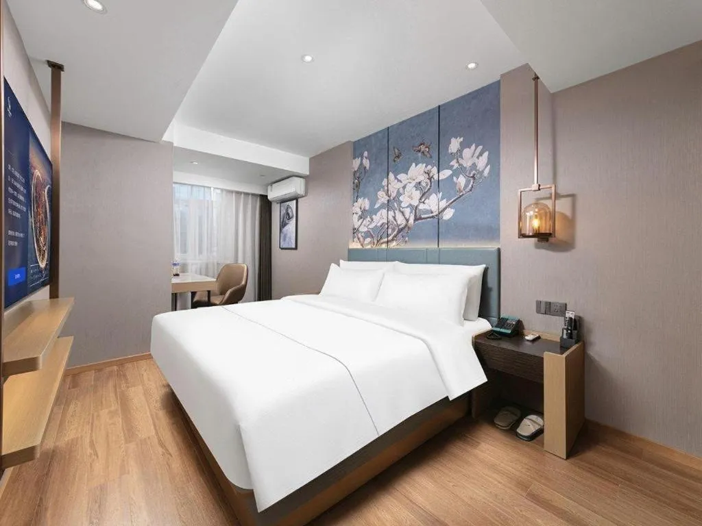 Bed in Magnotel Classic Shenyang General Hospital of Northern Theater Command