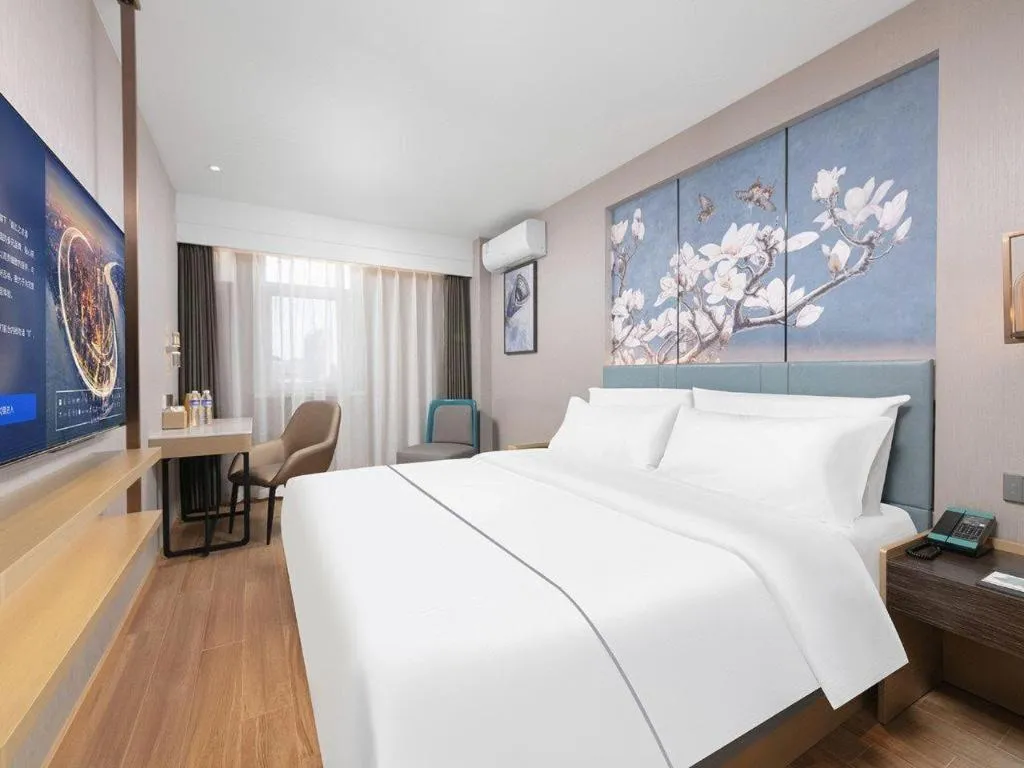 Bed in Magnotel Classic Shenyang General Hospital of Northern Theater Command