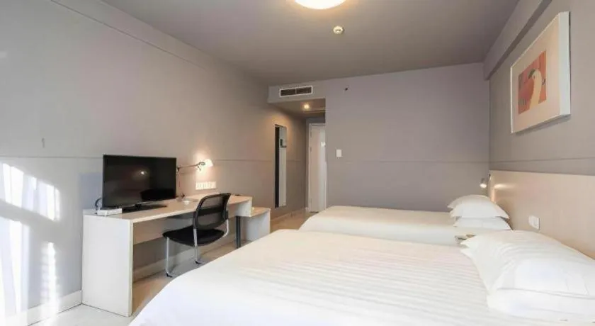 Bed in Magnotel Classic Shenyang General Hospital of Northern Theater Command