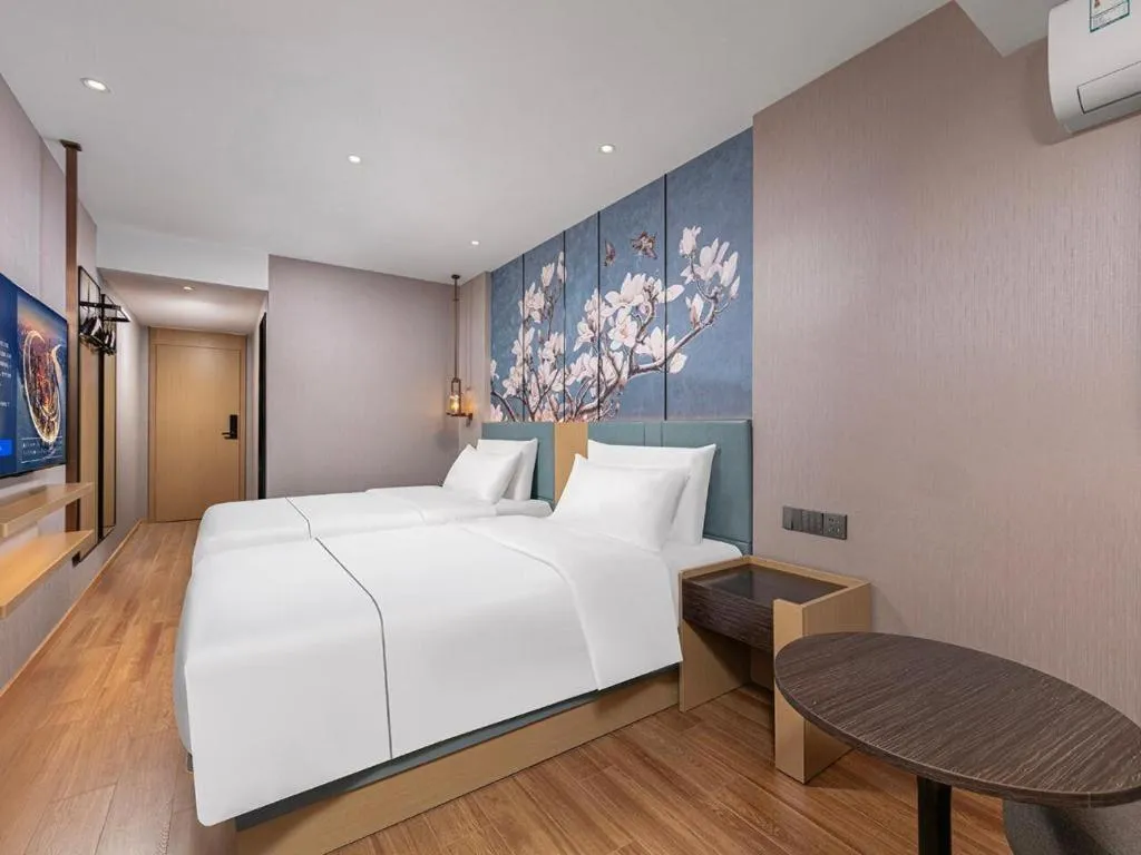 Bed in Magnotel Classic Shenyang General Hospital of Northern Theater Command