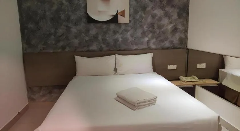Bed in Jin Hotel