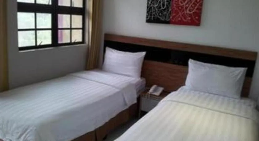 Bed in Jin Hotel