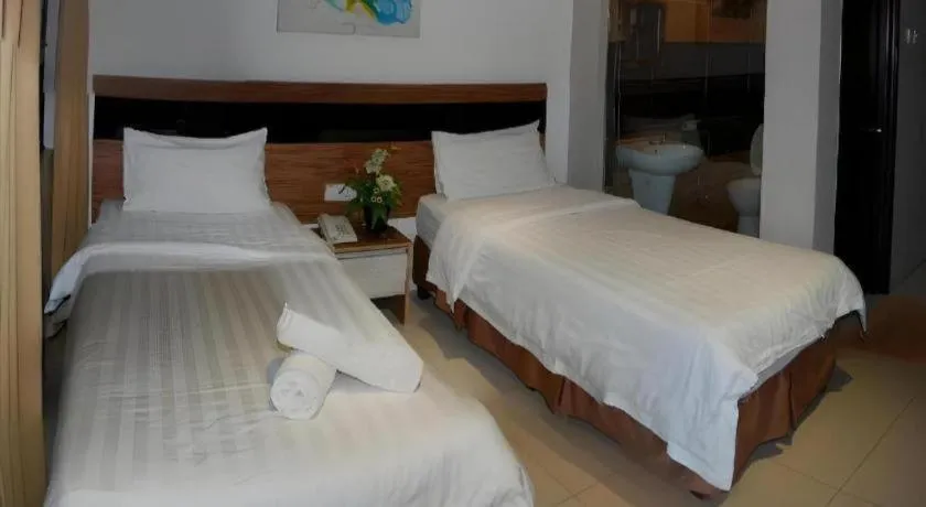 Bed in Jin Hotel