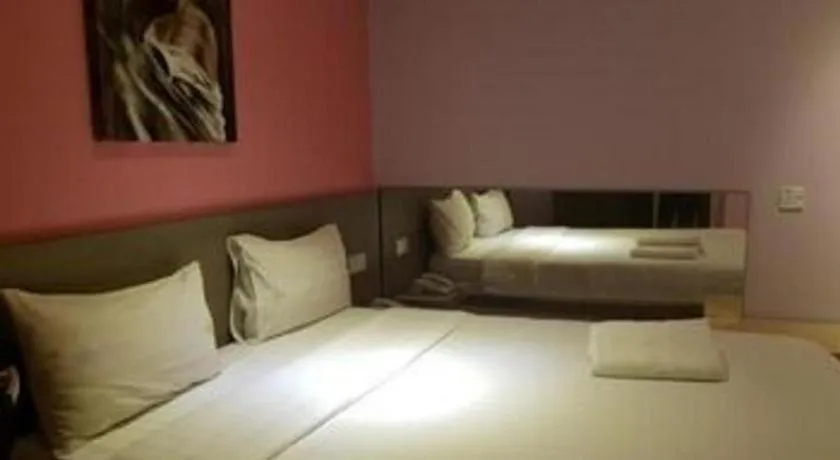 Bed in Jin Hotel