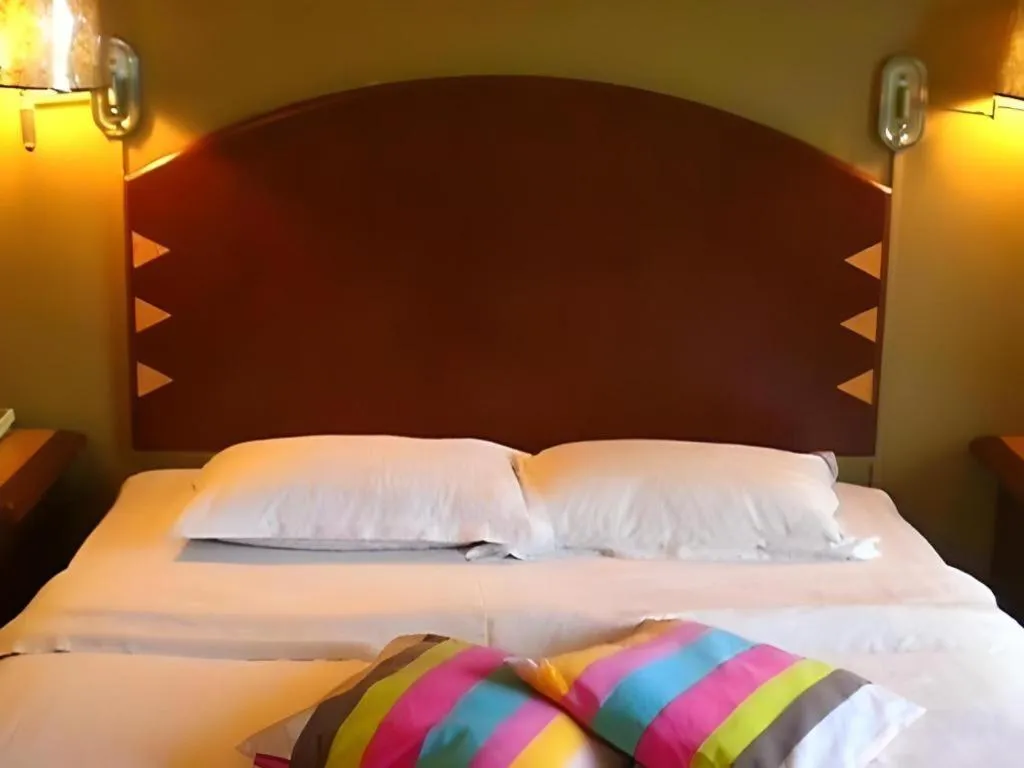 Bed in Casuarina Hotel