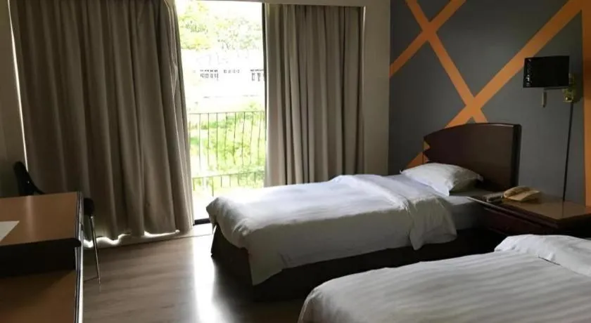 Bed in Casuarina Hotel