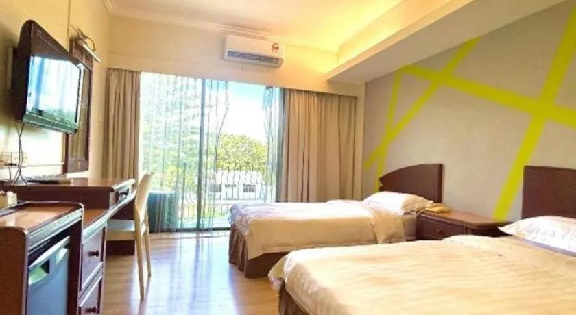 Bed in Casuarina Hotel