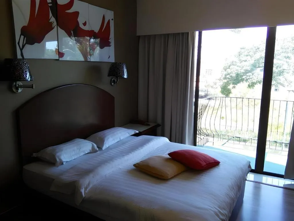 Bed in Casuarina Hotel