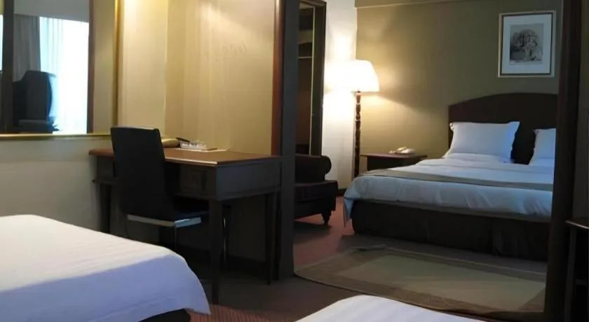Bed in Casuarina Hotel