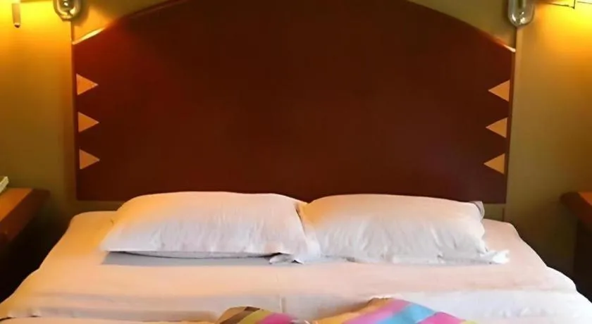 Bed in Casuarina Hotel