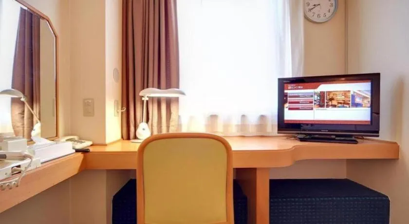 Bed in Roco Inn Matsuyama