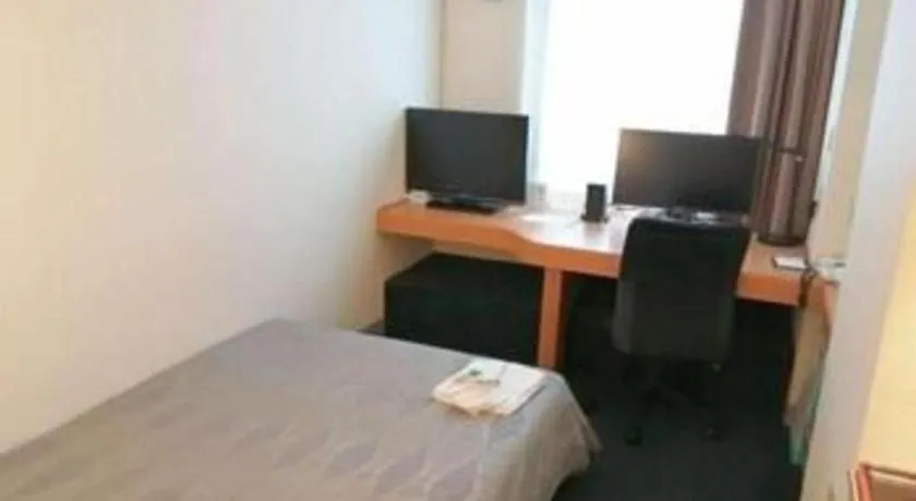 Bed in Roco Inn Matsuyama