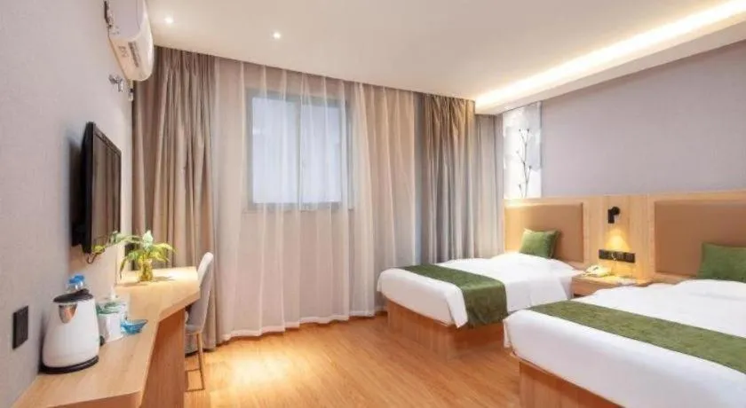 Bed in GreenTree Inn Shanghai Jiading Anting Motor City Express Hotel