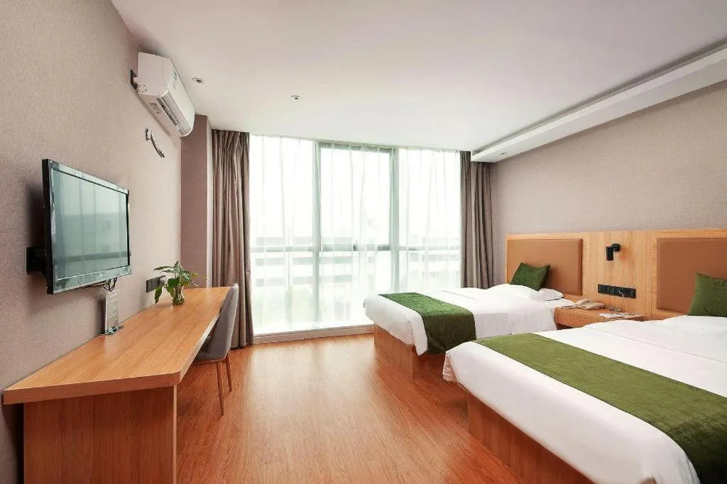 Bed in GreenTree Inn Shanghai Jiading Anting Motor City Express Hotel