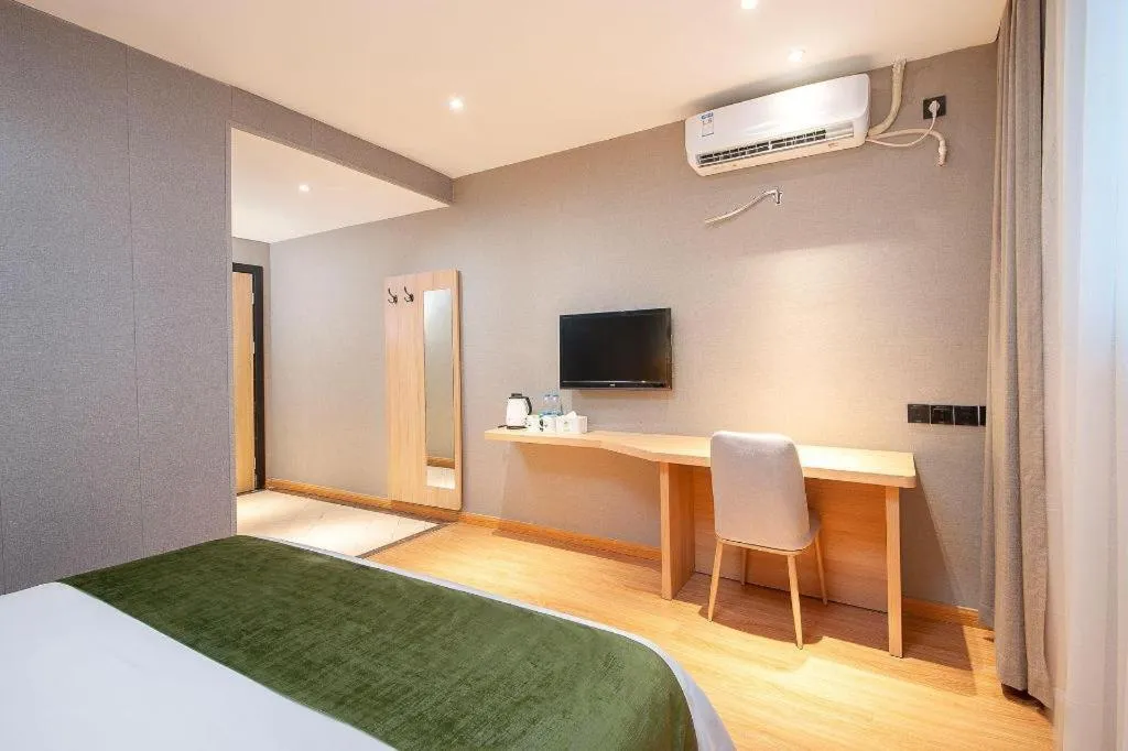 Bed in GreenTree Inn Shanghai Jiading Anting Motor City Express Hotel
