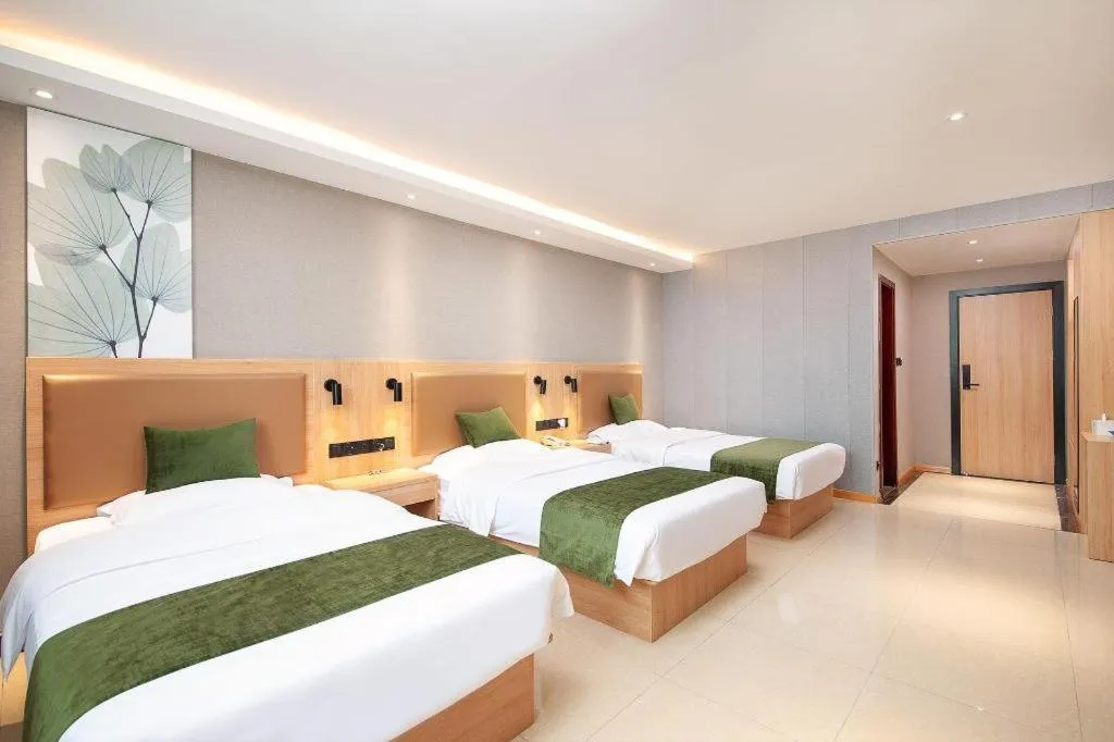 Bed in GreenTree Inn Shanghai Jiading Anting Motor City Express Hotel
