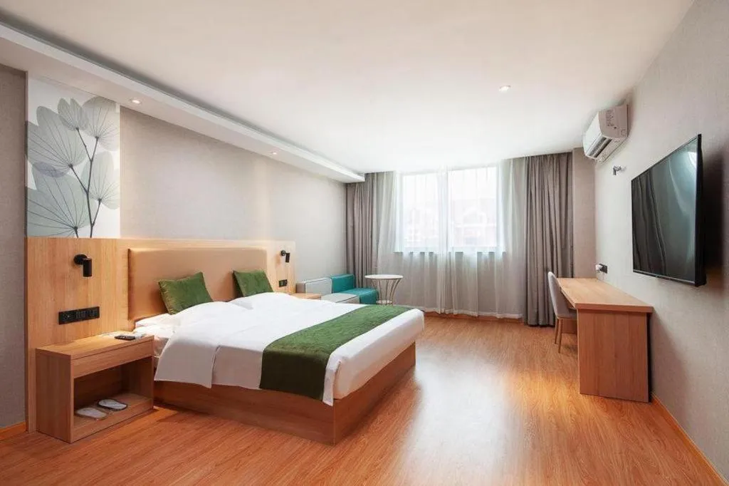 Bed in GreenTree Inn Shanghai Jiading Anting Motor City Express Hotel