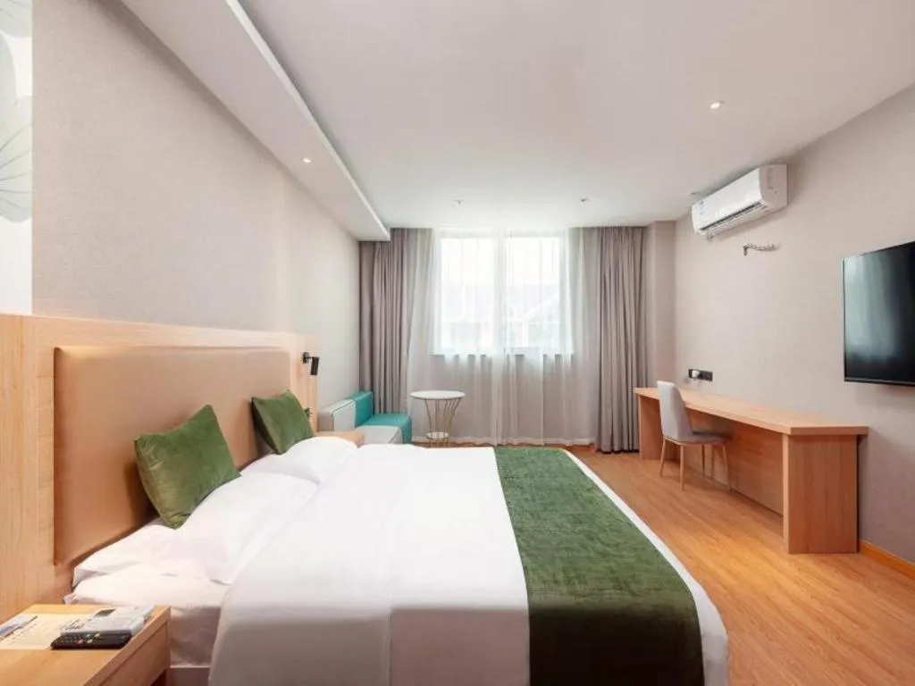Bed in GreenTree Inn Shanghai Jiading Anting Motor City Express Hotel