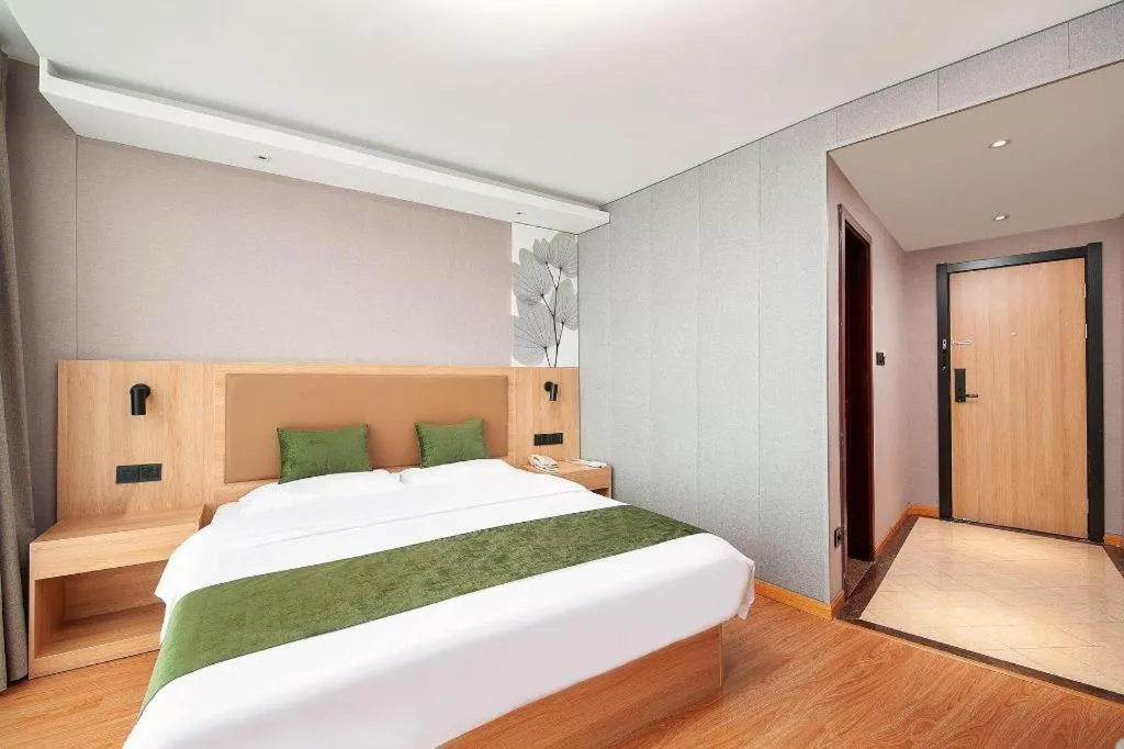 Bed in GreenTree Inn Shanghai Jiading Anting Motor City Express Hotel