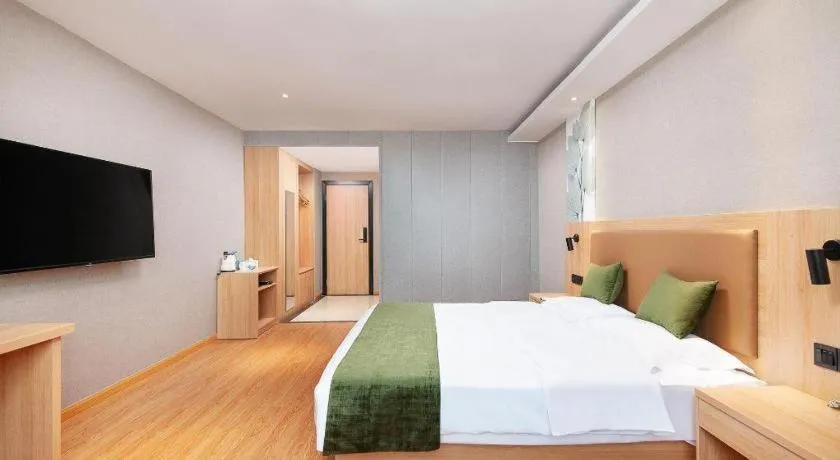 Bed in GreenTree Inn Shanghai Jiading Anting Motor City Express Hotel