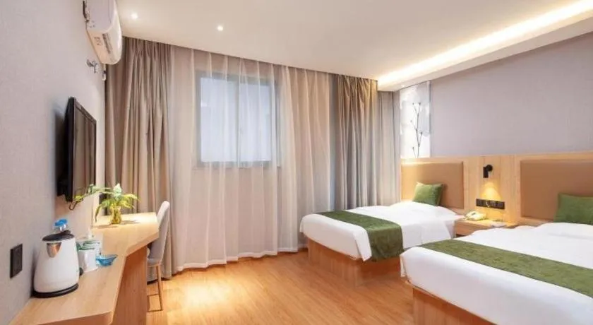 Bed in GreenTree Inn Shanghai Jiading Anting Motor City Express Hotel