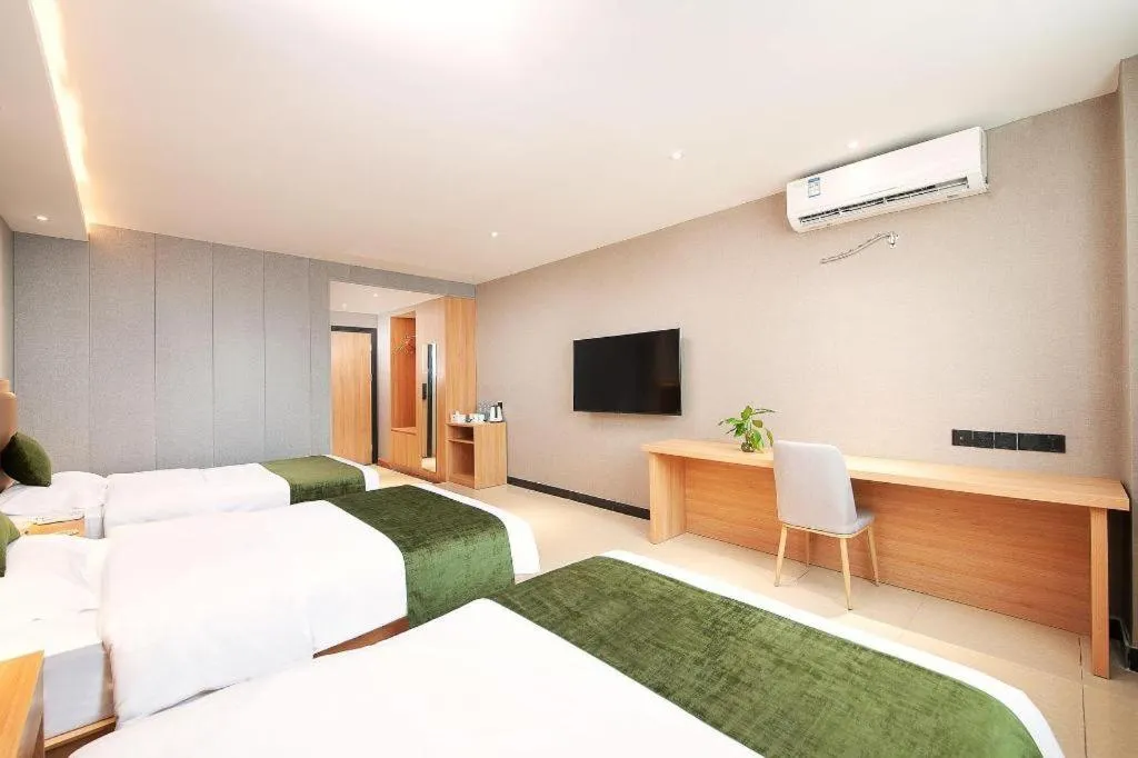 Bed in GreenTree Inn Shanghai Jiading Anting Motor City Express Hotel
