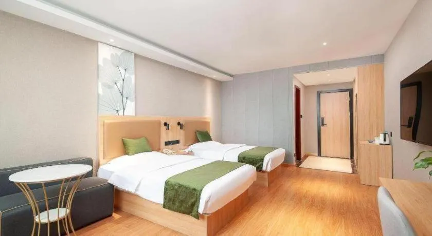 Bed in GreenTree Inn Shanghai Jiading Anting Motor City Express Hotel