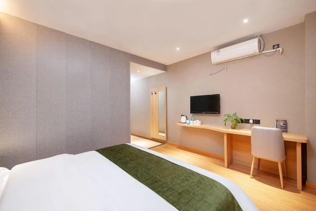 Bed in GreenTree Inn Shanghai Jiading Anting Motor City Express Hotel