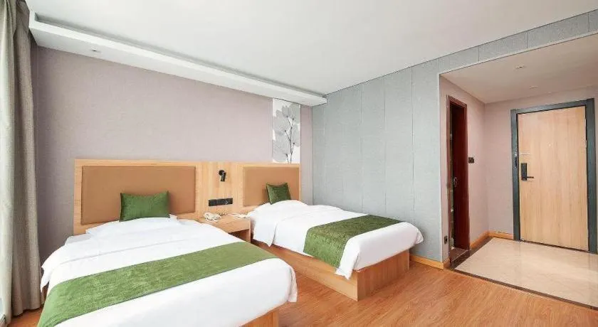 Bed in GreenTree Inn Shanghai Jiading Anting Motor City Express Hotel