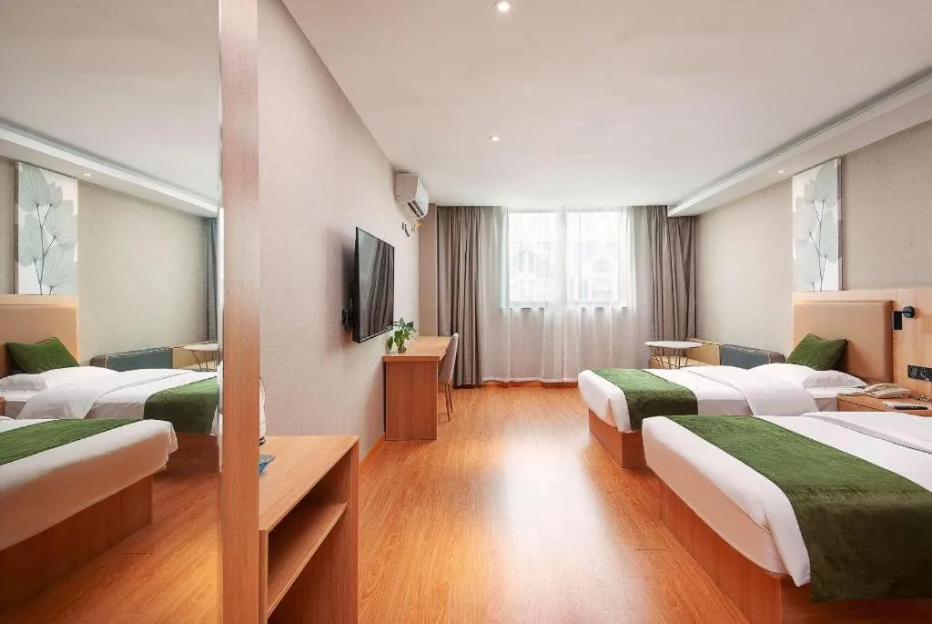Bed in GreenTree Inn Shanghai Jiading Anting Motor City Express Hotel