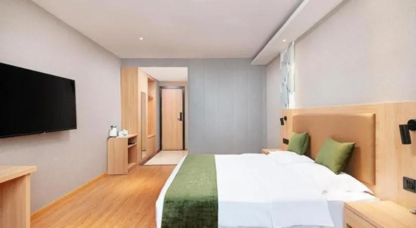 Bed in GreenTree Inn Shanghai Jiading Anting Motor City Express Hotel