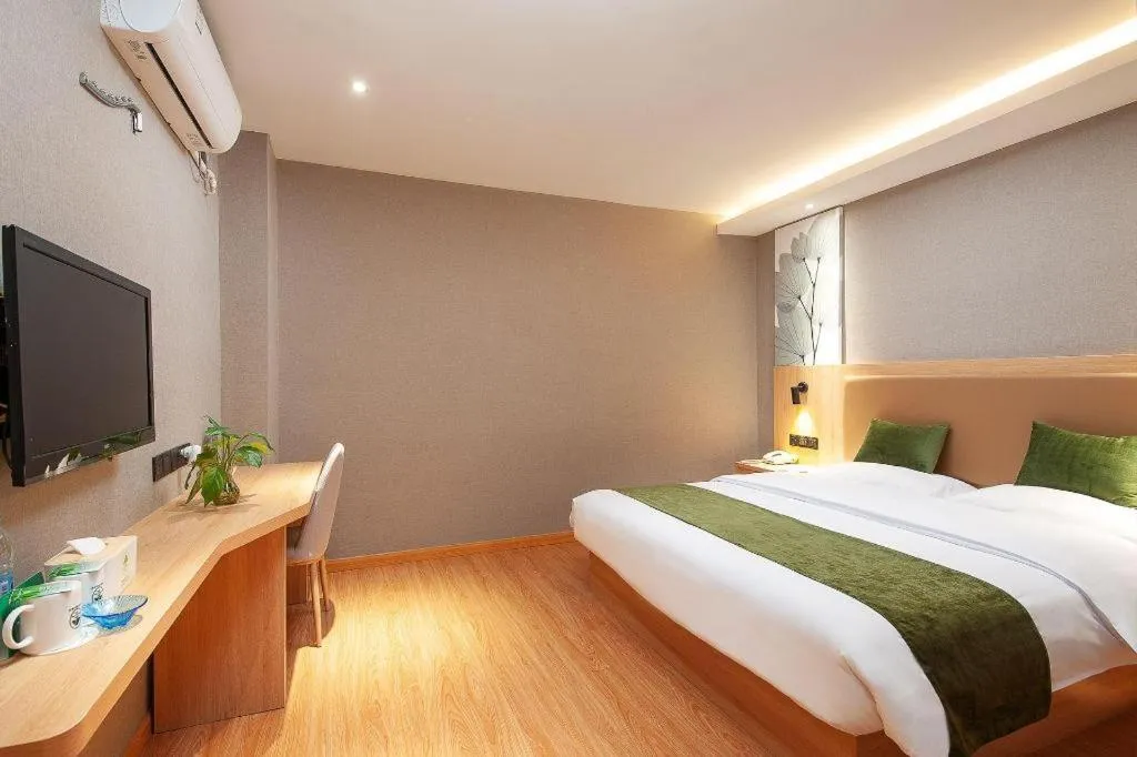 Bed in GreenTree Inn Shanghai Jiading Anting Motor City Express Hotel