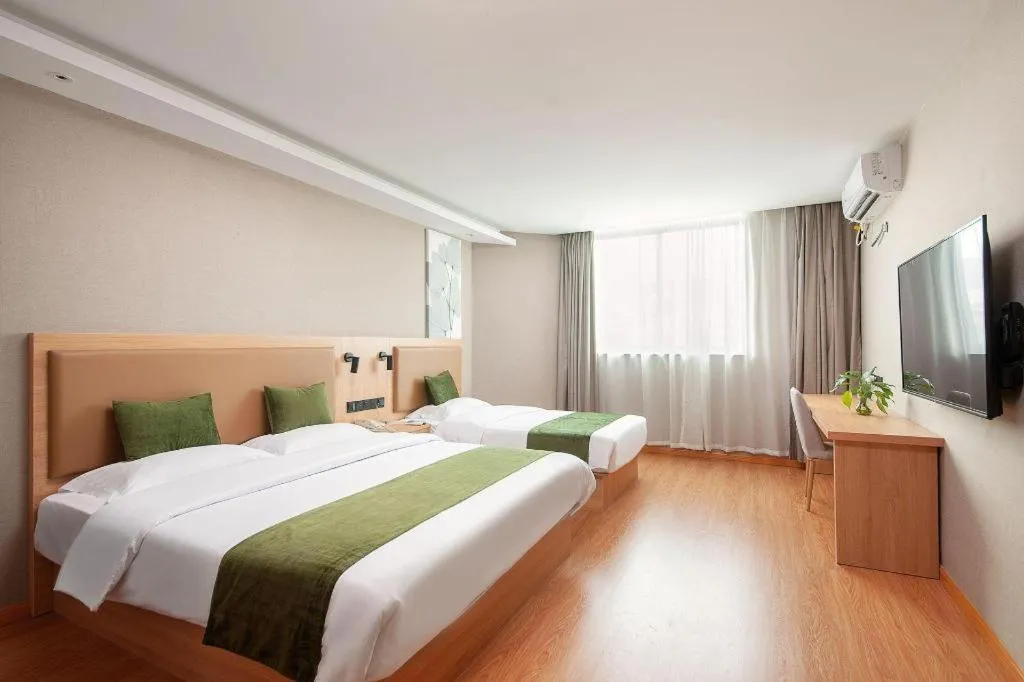 Bed in GreenTree Inn Shanghai Jiading Anting Motor City Express Hotel