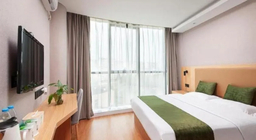 Bed in GreenTree Inn Shanghai Jiading Anting Motor City Express Hotel