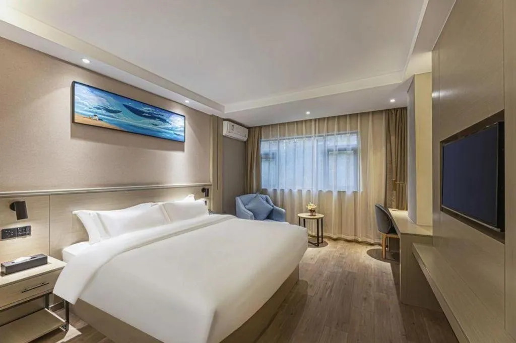 Bed in GreenTree Inn Shanghai Jiading Anting Motor City Express Hotel