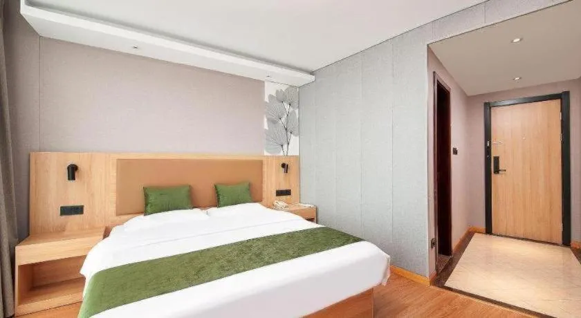 Bed in GreenTree Inn Shanghai Jiading Anting Motor City Express Hotel