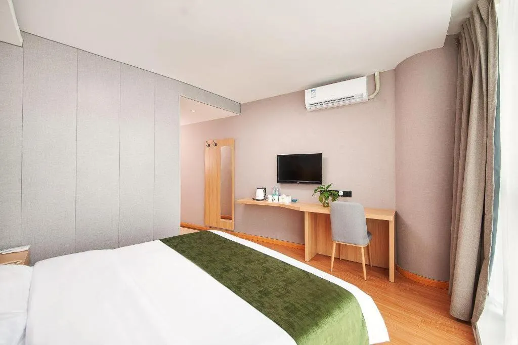 Bed in GreenTree Inn Shanghai Jiading Anting Motor City Express Hotel
