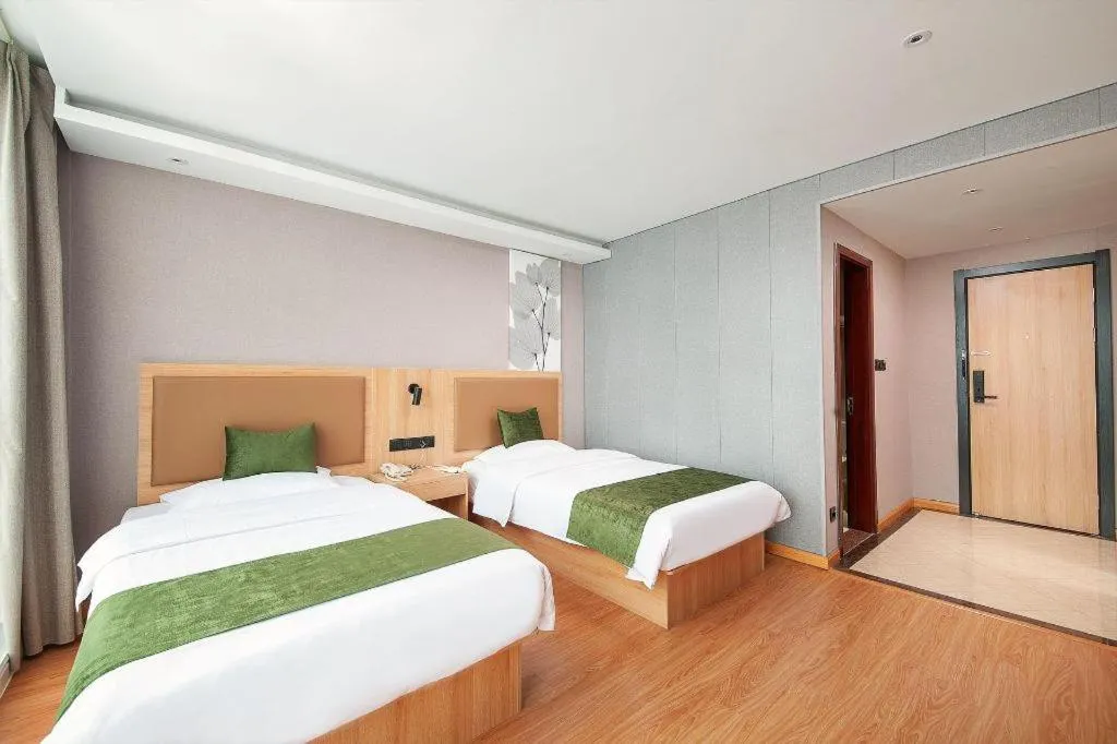 Bed in GreenTree Inn Shanghai Jiading Anting Motor City Express Hotel