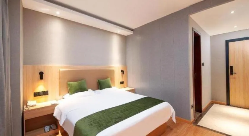 Bed in GreenTree Inn Shanghai Jiading Anting Motor City Express Hotel