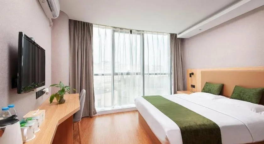 Bed in GreenTree Inn Shanghai Jiading Anting Motor City Express Hotel