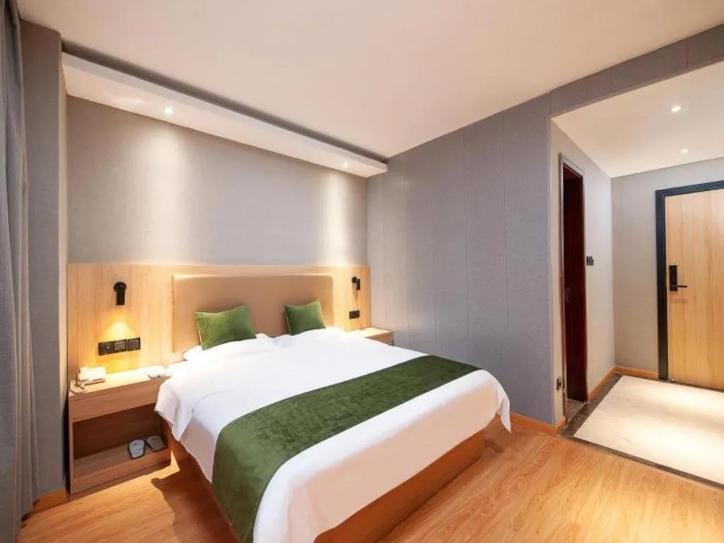 Bed in GreenTree Inn Shanghai Jiading Anting Motor City Express Hotel