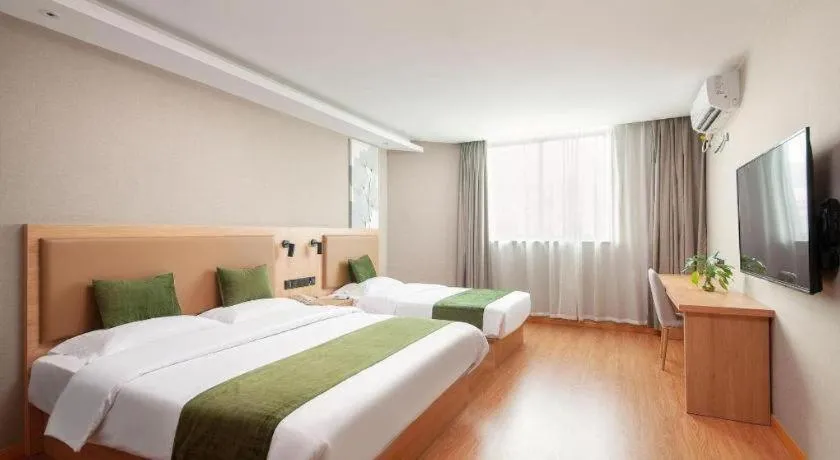Bed in GreenTree Inn Shanghai Jiading Anting Motor City Express Hotel