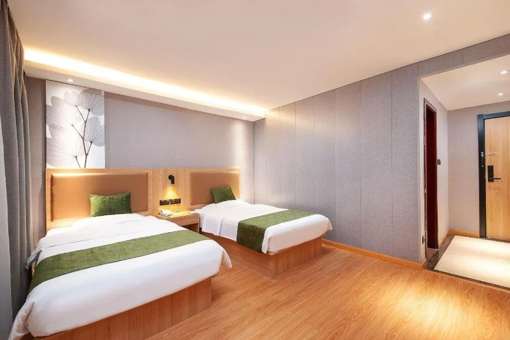 Bed in GreenTree Inn Shanghai Jiading Anting Motor City Express Hotel