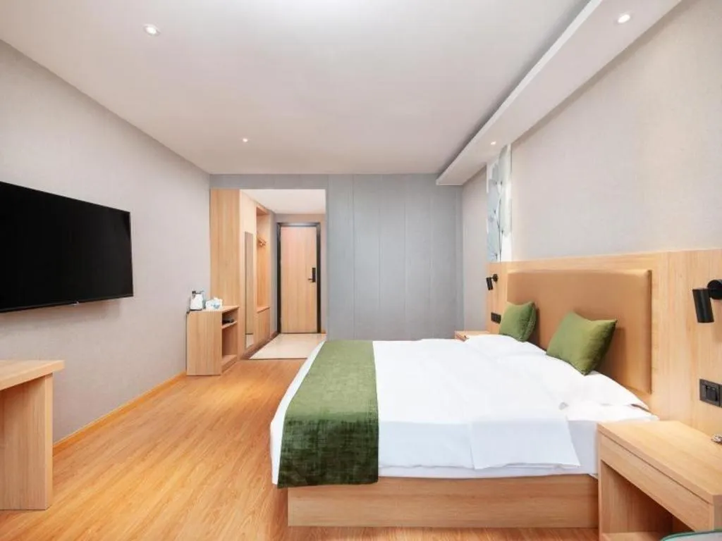 Bed in GreenTree Inn Shanghai Jiading Anting Motor City Express Hotel