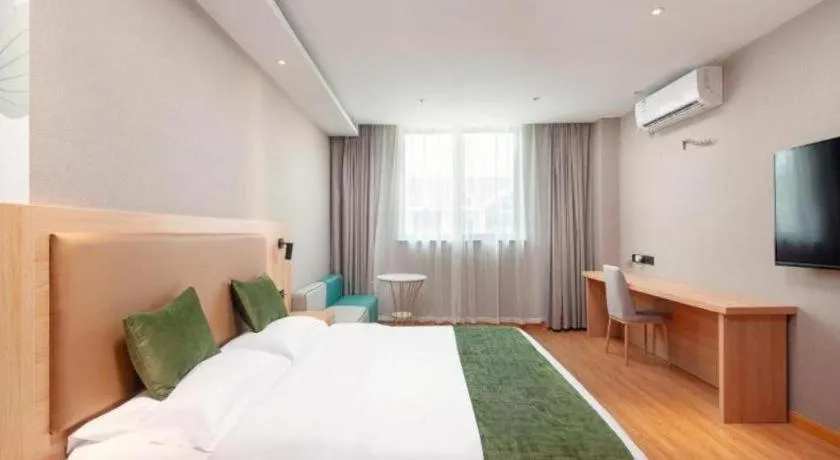Bed in GreenTree Inn Shanghai Jiading Anting Motor City Express Hotel