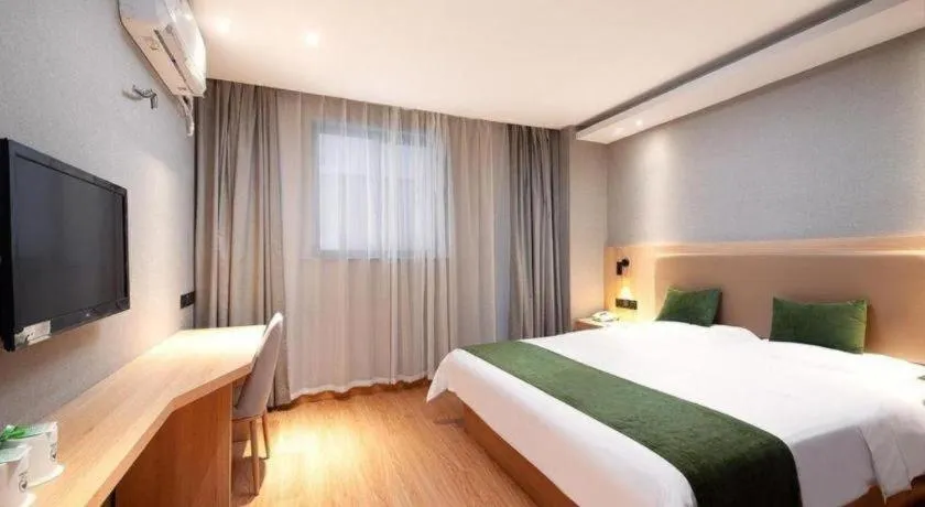 Bed in GreenTree Inn Shanghai Jiading Anting Motor City Express Hotel