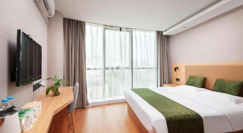 Bed in GreenTree Inn Shanghai Jiading Anting Motor City Express Hotel